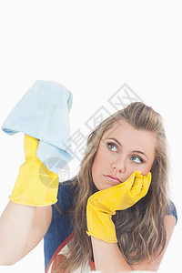 穿黄色手套的年轻女仆 用喷尘器图片