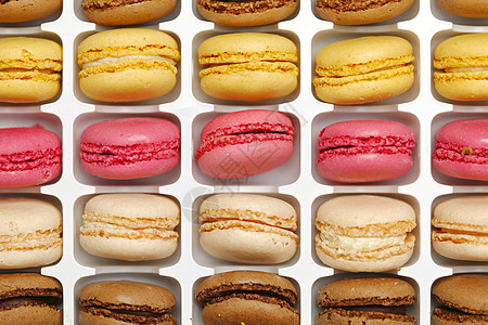 色彩多彩的马卡龙白色蛋糕食物糕点糖果饼干甜点盒子美食奶油图片