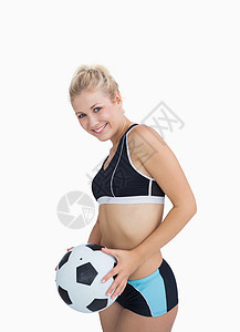 穿着足球运动服的快乐女人的肖像女士浅色活动头发金发女郎运动闲暇金发女性训练图片