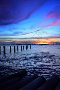 锡昌岛环绕着黄昏的天空海洋建筑夕阳休息海景场景戏剧性日落海浪旅行图片