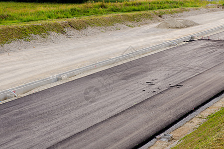 道路平面和沥青机械振动器车道压实机地面振动装载机工作建设者铺路图片