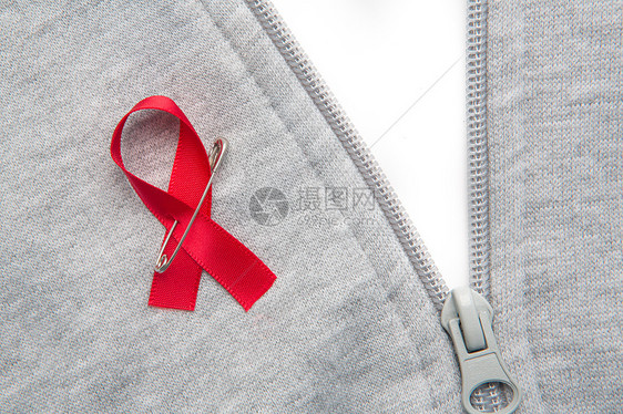 AIDS 认知丝带绑在灰色拉链上图片