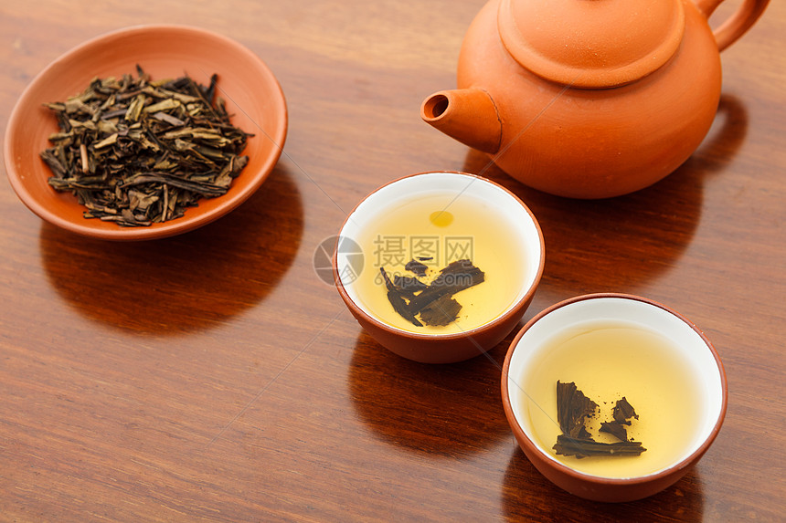 中华茶茶仪式飞碟木头叶子茶壶草本植物杯子工夫茶叶饮料文化图片
