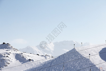 山峰峰全景滑雪季节日出天空童话高山旅游阳光旅行图片