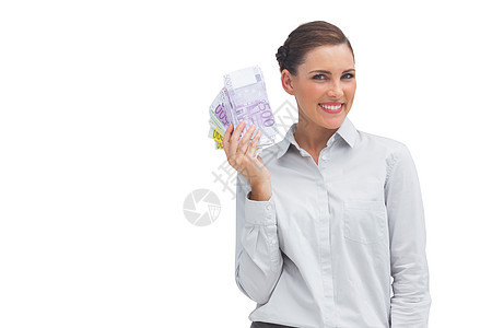 开心的女商务人士展示了很多钱图片