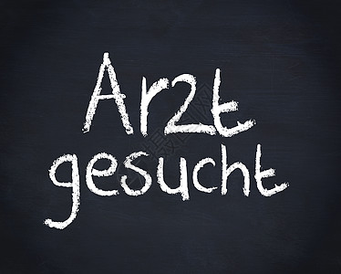 在黑板上写着德语词arzt geucht图片