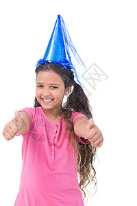 带着蓝帽子微笑的小女孩 在派对上玩大拇指图片