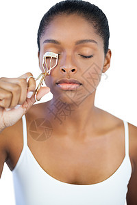 年轻女人用卷卷子做眼睫毛图片