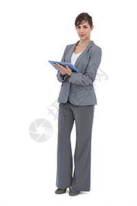 拥有平板电脑的女商务人士女士头发商务女性商业触摸屏快乐套装滚动人士图片