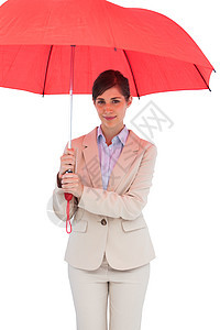 带伞的青年女商务人士图片