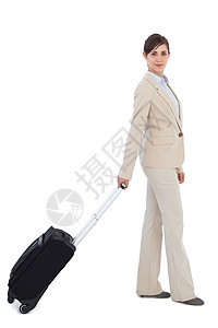 女商务人士拉行李箱手提箱棕色人士商业商务职业行李女性快乐套装图片