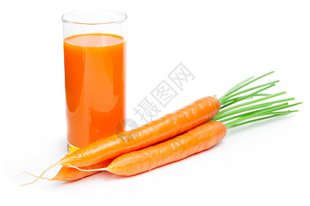 果汁糖果玻璃胡萝卜汁和新鲜的胡萝卜背景