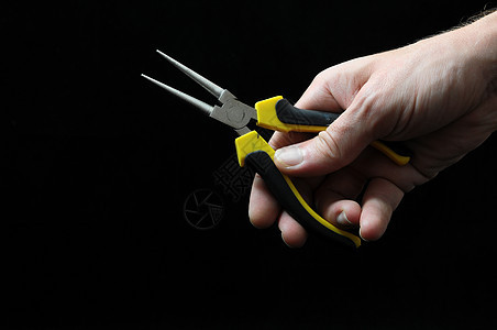 钳子和手手套塑料技术黑色电气电工扳手建造工具乐器图片