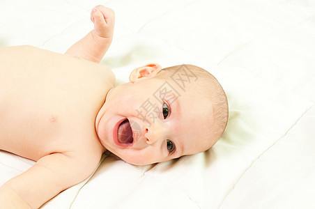 婴儿微笑女儿毯子童年床罩眼睛快乐环境工作室身体摄影背景图片