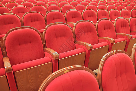 红戏剧红椅的背景背景Name金子红色窗帘艺术装饰品天鹅绒礼堂扶手歌剧纺织品图片