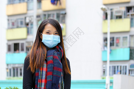 在拥挤的城市 戴医疗面罩的妇女街道细菌面具安全女孩感染物质女性呼吸灰尘图片