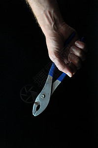 钳子和手建造技术乐器修理工金属塑料白色工作工人维修图片