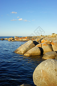 火焰湾 塔斯马尼亚 澳大利亚名胜旅行海湾假期旅游海洋日落海滩海岸岩石图片