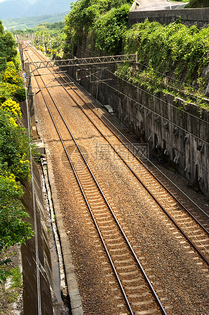 铁路小路场地绿色过境岩石森林运输火车草地旅行图片