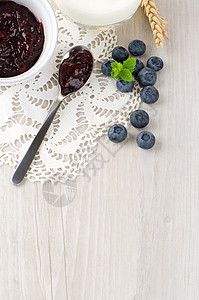 带新鲜蓝莓的酸奶工作室茶点宏观小吃美食饮食团体水果蓝色蜂蜜图片