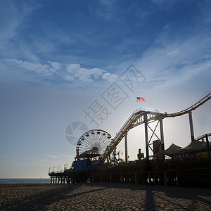 加州日落时分圣莫伊卡码头费里斯轮日落海景波浪摩天轮天空海岸线海滩支撑建筑学旅行图片