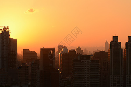 日落城市风景太阳天空建筑学天际景观住宅旅行摩天大楼戏剧性首都图片