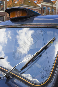 旧式挡风玻璃擦拭器 经典版的挡风玻璃擦擦器详情车辆古物驾驶黑色古董天空橙子轿车复兴奢华图片