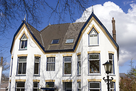恢复典型的荷兰住房蓝色石头灯笼建筑日落财产旅行住宅旅游历史图片