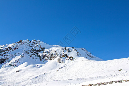 冬季山区风景高度顶峰蓝色晴天天空全景荒野冰川首脑图片