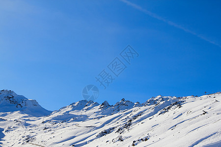 冬季山区荒野天空顶峰蓝色全景高山岩石首脑高度冰川图片