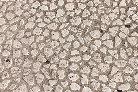 作为背景的石头铺路面人行道小路城市材料街道铺路线条岩石鹅卵石花岗岩图片