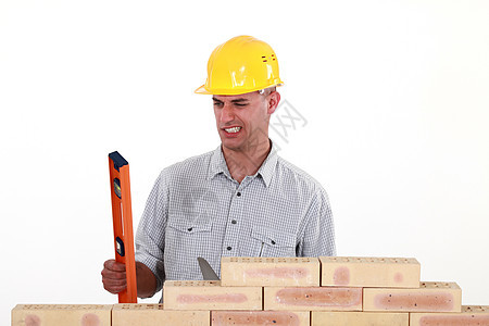 具有精神水平的布丁贸易工装建筑石匠瓦工工人建设者石工服务工作图片