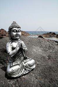 佛像雕像热带佛教徒支撑雕塑男人崇拜石头祷告金子假期图片