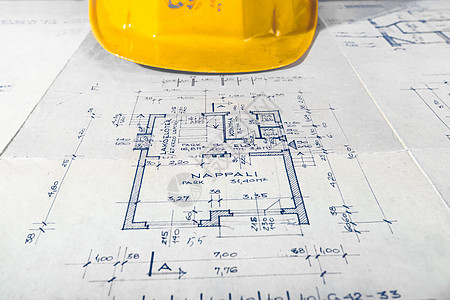 一名有计划的工程师的黄色头盔黄头盔商业绘画建筑学建筑师房子工程建造建筑草图项目图片