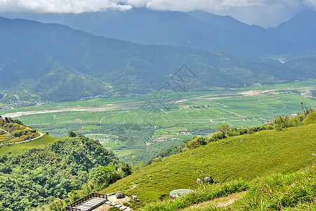 Hualien乡边草原牧歌环境植物学植物建筑物天空地形花瓣天堂图片