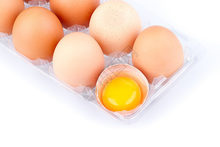 塑料透明包装袋中的鸡蛋和蛋黄团体食物农场包装黄色棕色盒子白色托盘产品图片