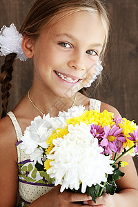 持鲜花儿童花朵喜悦乐趣快乐孩子青年花束童年工作室菊花图片