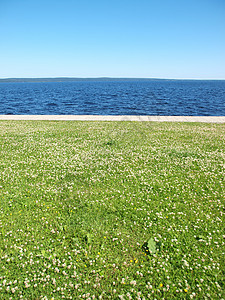 湖 天空和草草季节石头太阳海浪花岗岩码头天气绿色蓝色图片