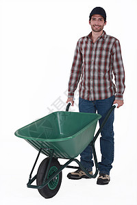 带手推车的男子衬衫男人独轮车种植劳动园艺绿化工具家务工人图片