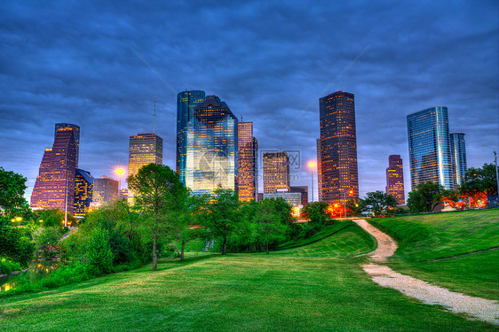 休斯顿德克萨斯州现代天线 在公园的日落黄昏时景观天空商业城市镜子办公室建筑物旅行市中心中心图片