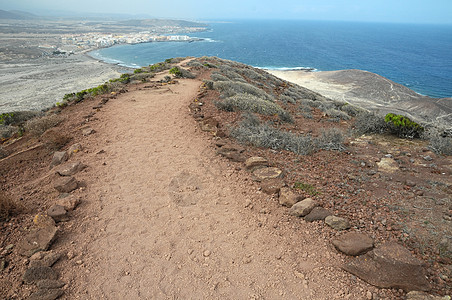 沙岩和岩石沙漠风景荒野旅行土地沙丘石头爬坡阴影天空巨石图片