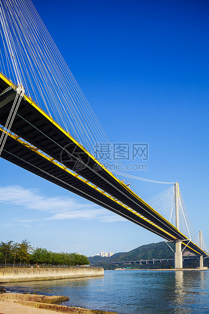 香港的廷九桥吊桥通道海岸天际运输蓝天海洋地标爬坡街道天空图片