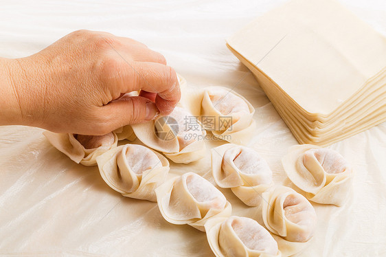 土制中国包子农历手工节日水角雕刻新年蔬菜烹饪月球饺子图片