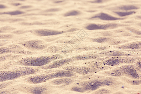 沙滩背景花纹棕色黄色沙丘涟漪金子沙漠颗粒状海浪波纹图片