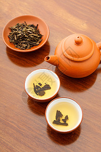 传统中国茶茶壶功夫干叶木头草本植物陶器工夫飞碟叶子食物图片