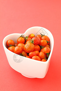 樱桃番茄有爱沙拉宏观水果收成红色粉色叶子蔬菜饮食绿色图片