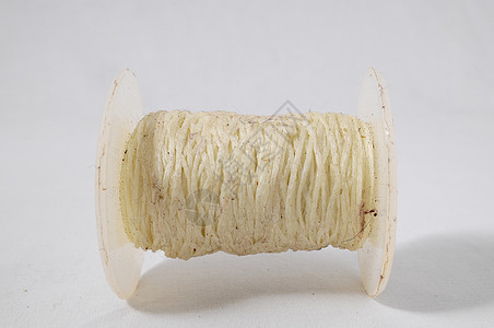 双线卷材料棕色毛巾细绳线索纺织品白色纤维领带羊毛图片