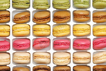 色彩多彩的马卡龙饼干糕点食物美食奶油白色盒子蛋糕糖果甜点图片