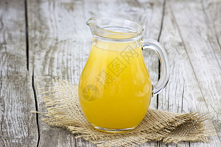 喝果汁果汁在结壳里黄色甜点调味橙子水果水壶饮料饮食玻璃早餐背景
