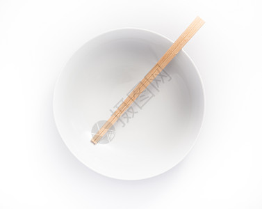 空碗中的一次性筷子 孤立在白色的后院餐具图片